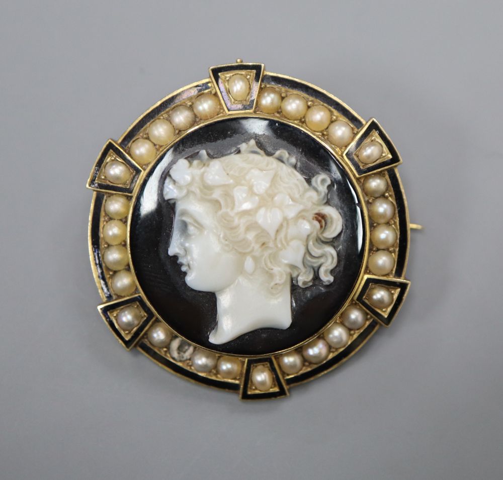 A 19th century gold (tests as 14ct), enamel and pearl target pendant brooch,
